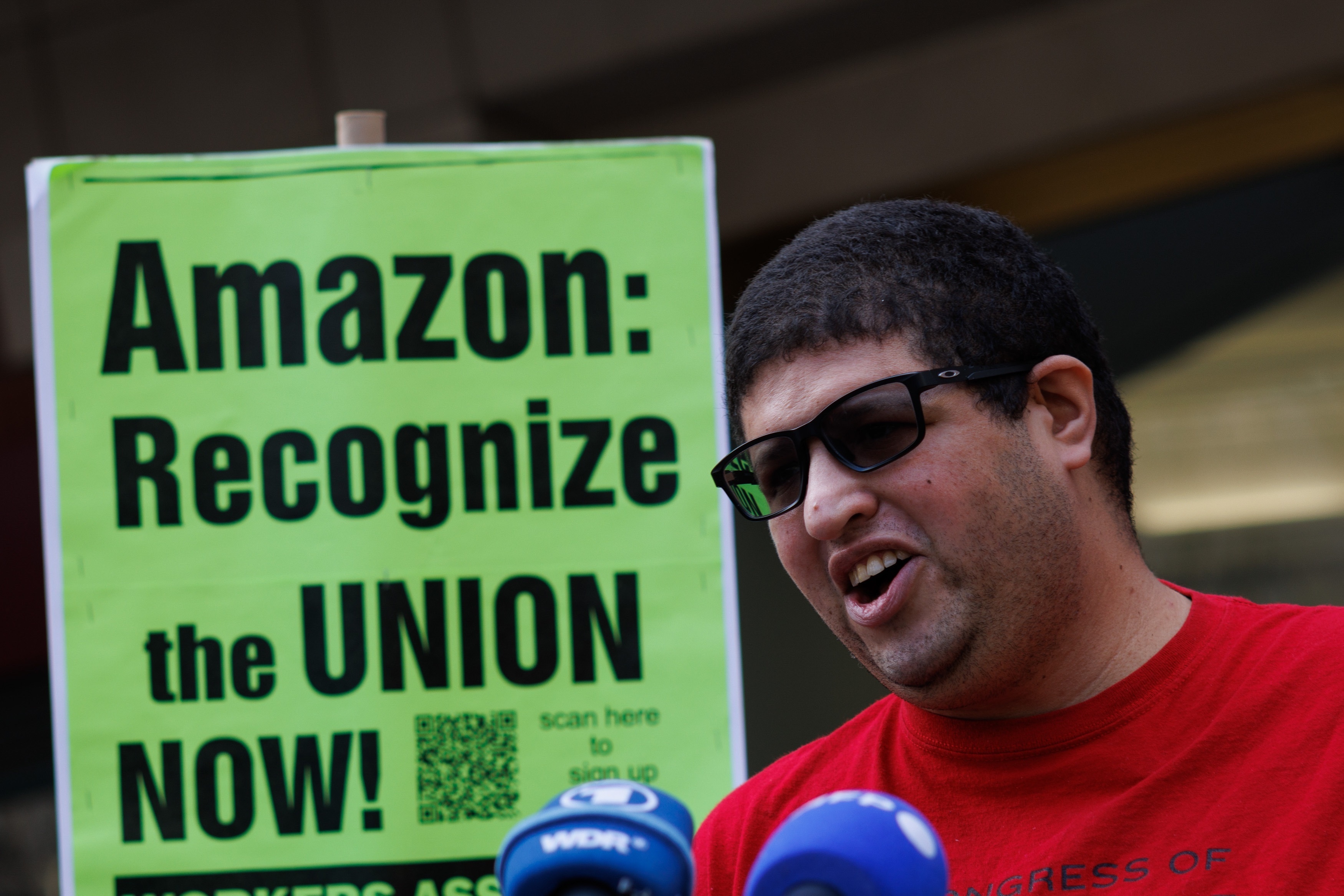 Amazon JFK8 distribution center union organizer Jason Anthony speaks to media during the voting results to unionize   Friday, April 1, 2022, in Brooklyn borough of New York.  Amazon workers in Staten Island, N.Y. voted to unionize on Friday, marking the first successful U.S. organizing effort in the retail giantâ€™s history and handing an unexpected win to a nascent group that fueled the union drive.    (AP Photo/Eduardo Munoz Alvarez)