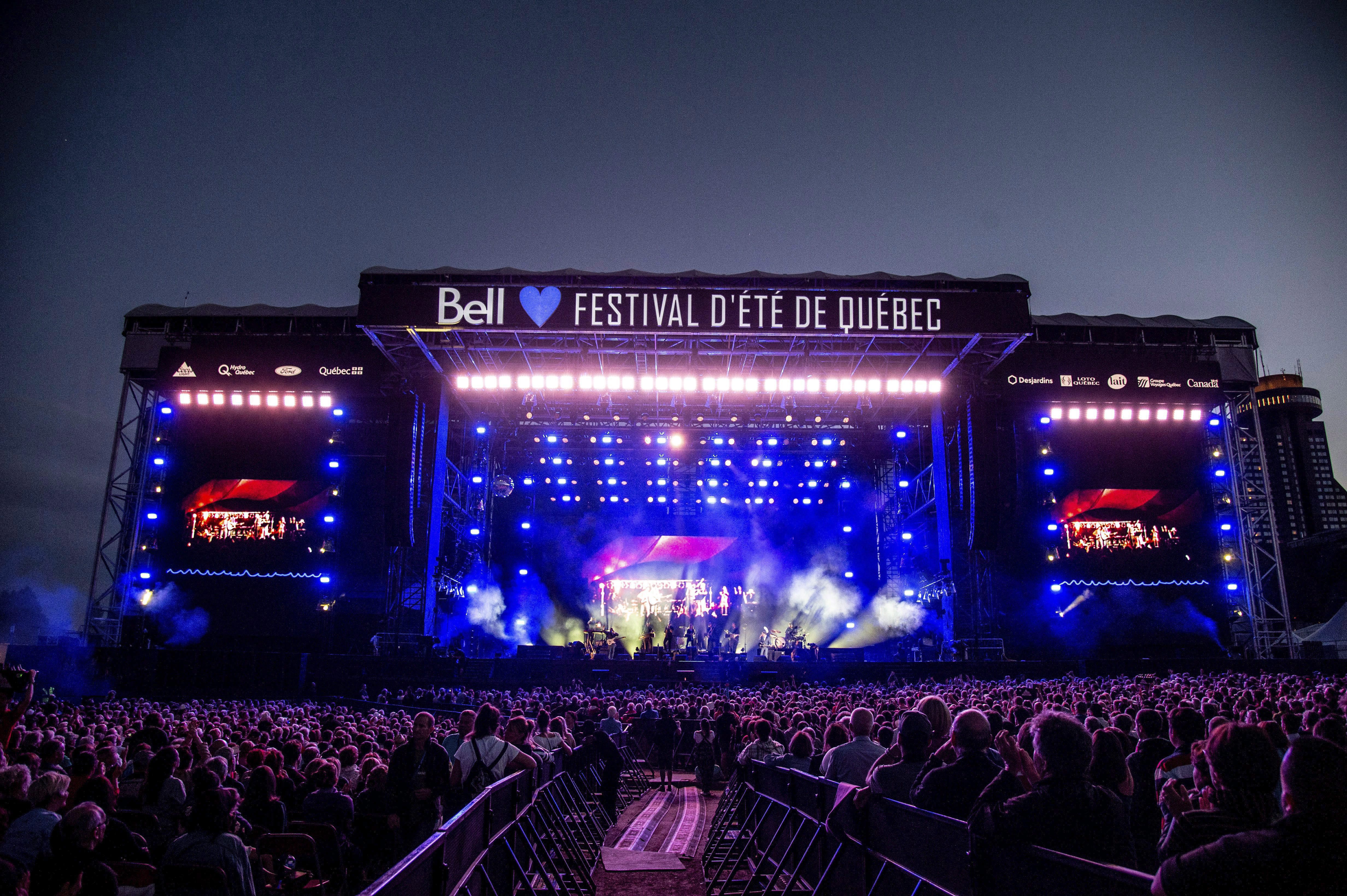 Festival-goers attend the Festival d'ete de Quebec on in Quebec City on July 10, 2018. THE CANADIAN PRESS/AP, Invision - Amy Harris