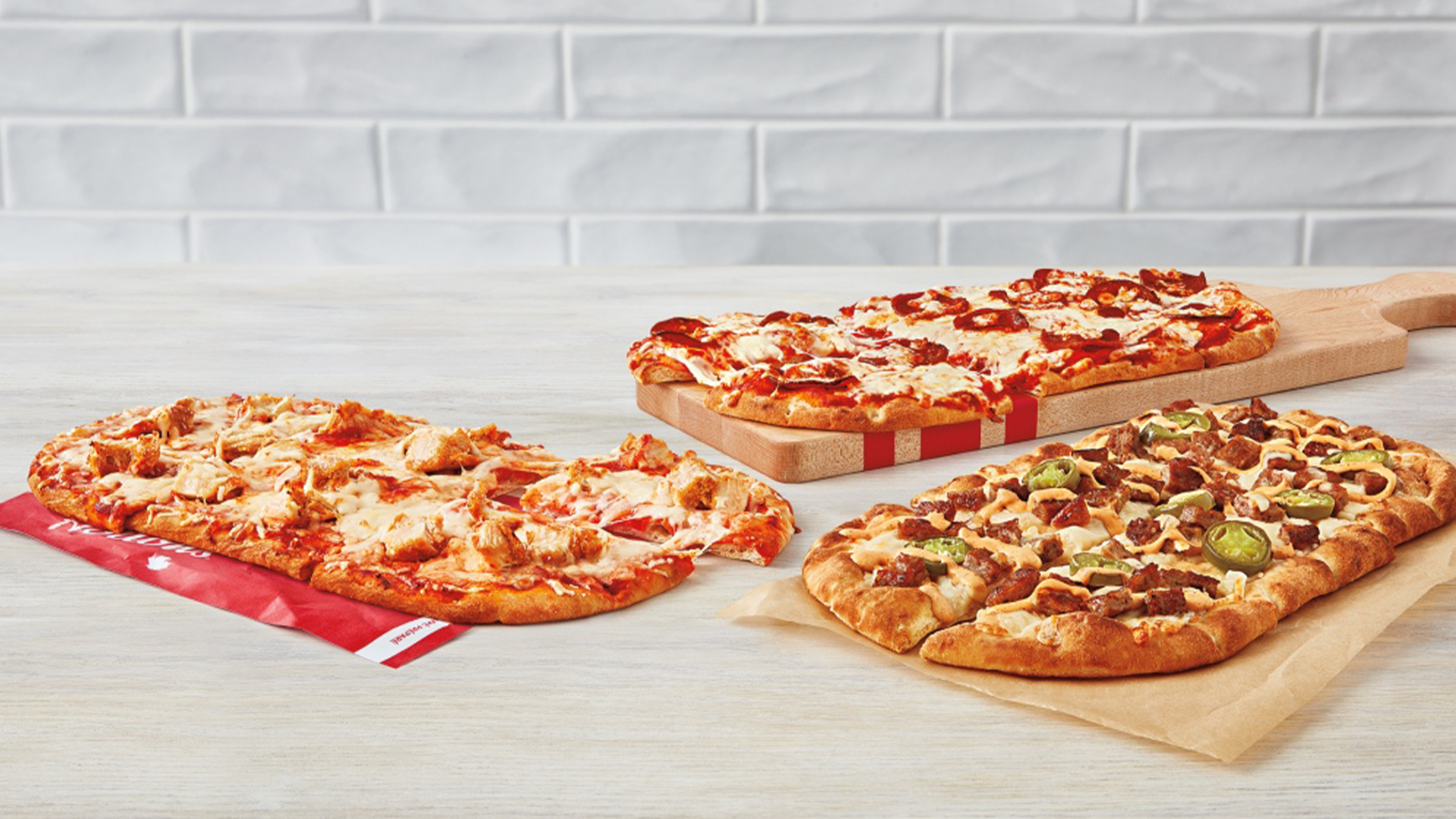La chaîne de restauration Tim Hortons y va d’un nouvel essai en ajoutant des pizzas à son menu dans quelques-uns de ses restaurants.