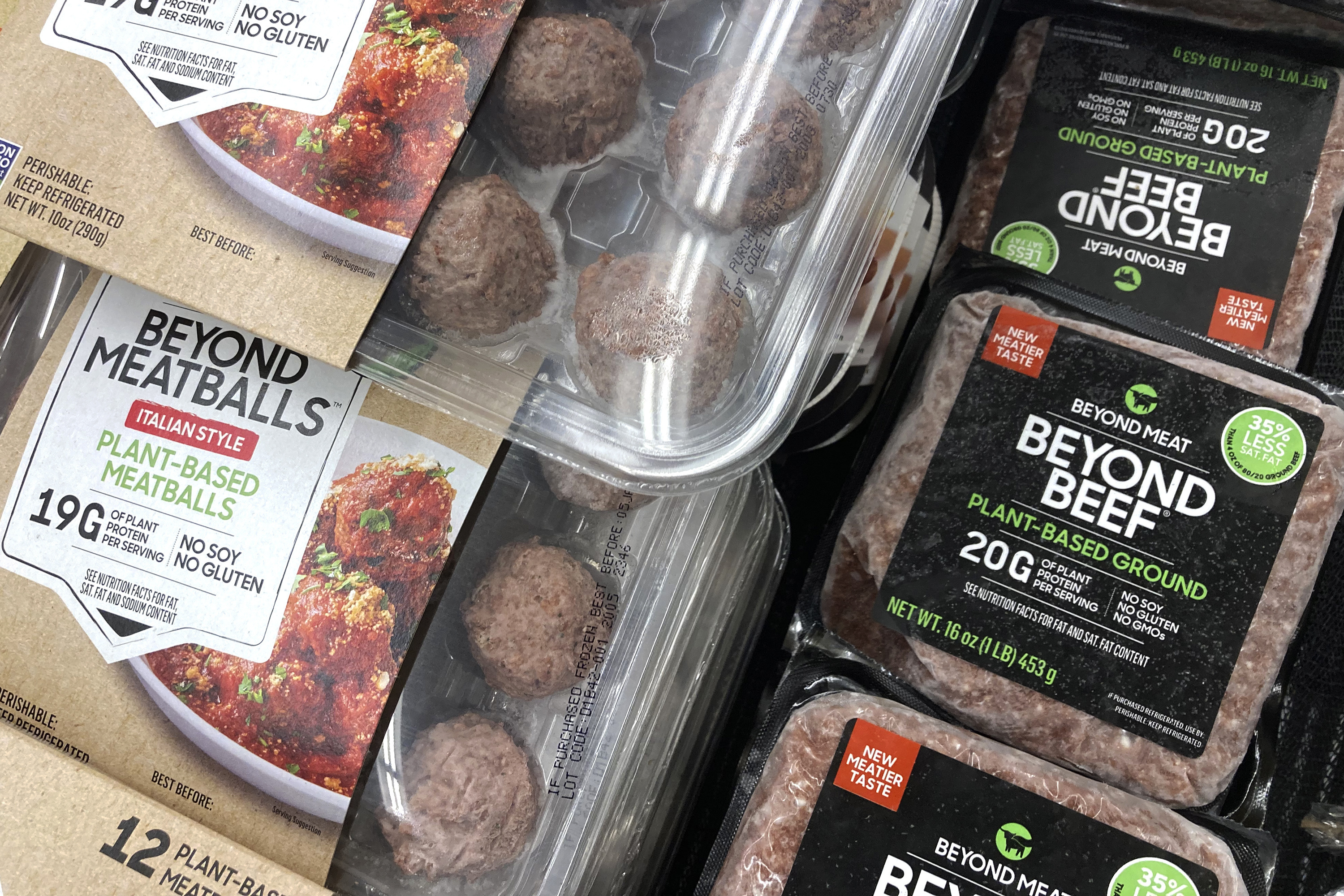 FILE - Beyond Meat products are seen in a refrigerated case inside a grocery store in Mount Prospect, Ill., Saturday, Feb. 19, 2022.  On Wednesday, May 11, 2022, the plant-based meat company reported lower-than-expected sales in the first quarter as it slashed prices and demand from restaurants fell. (AP Photo/Nam Y. Huh, File)