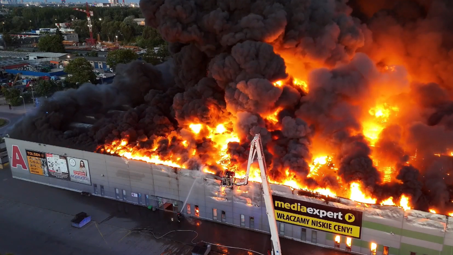 Fire engulfs a 1,400-store shopping center in Poland