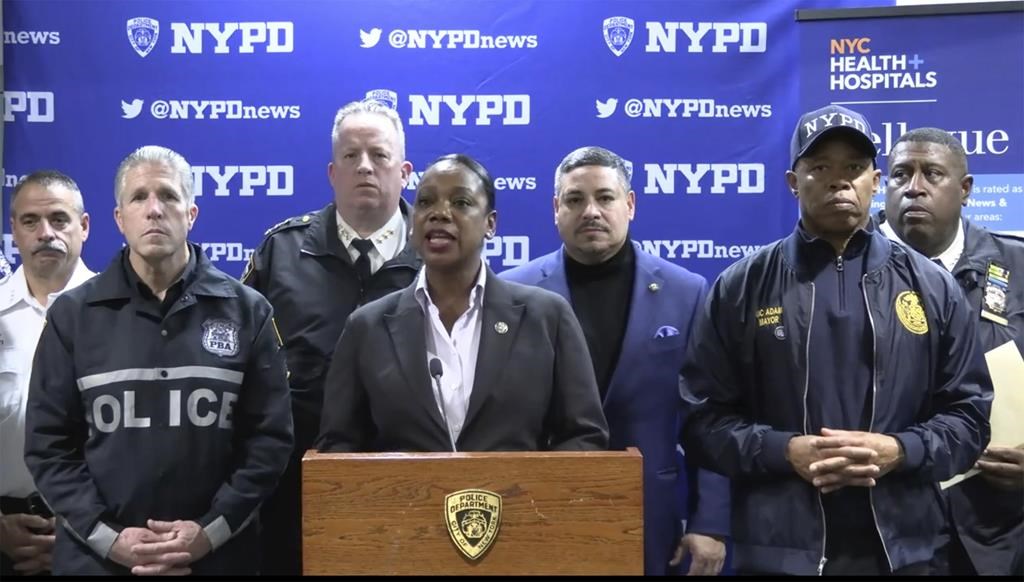 This photo provided by NYPD, New York City Police Commissioner Keechant Sewell address the media during a news conference on Saturday, Dec. 31, 2022. A man wielding a machete attacked three police officers at the New Year’s Eve celebration in New York City, authorities said, striking two of them in the head before an officer shot the man in the shoulder. The two officers were hospitalized, one with a fractured skull and the other with a bad cut, but expected to recover. (NYPD via AP)