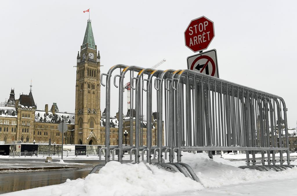 Fencing is seen on Parliament Hill in Ottawa, one year after the Freedom Convoy protests took place, on Friday, Jan. 27, 2023. The Parliamentary Protective Service expects 500 people to gather this weekend to mark a year since the "Freedom Convoy" occupied downtown Ottawa. THE CANADIAN PRESS/Justin Tang