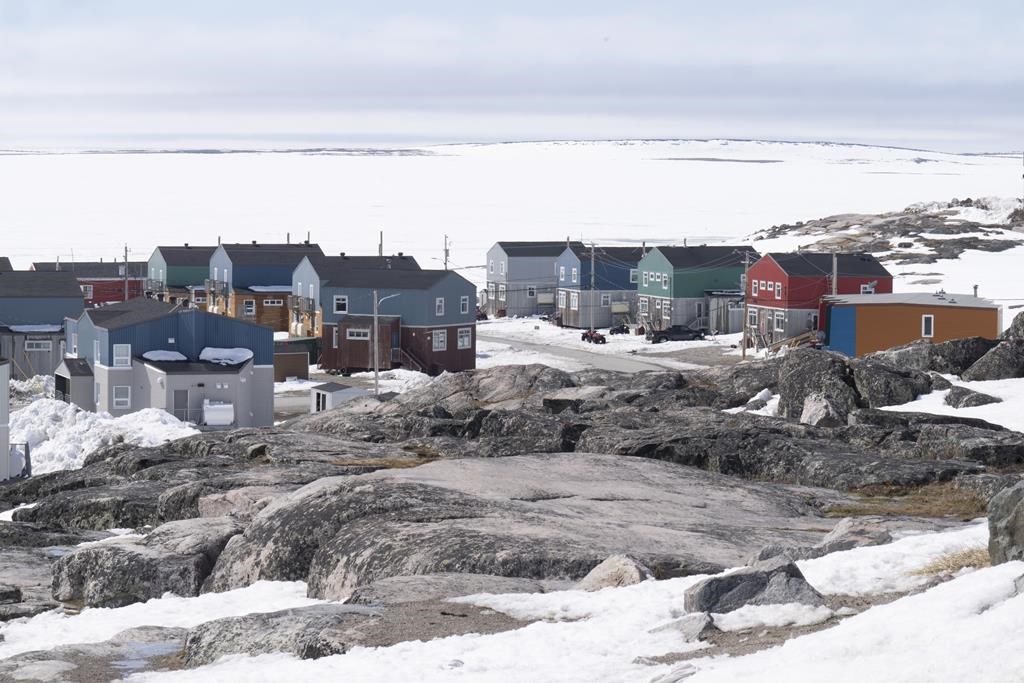 Homes face the Hudson Bay in Inukjuak, Que., on Thursday, May 12, 2022. Inuit are detained in Quebec provincial jails at a rate 15 times higher than other Quebecers, despite a decline in the overall number of Inuit in provincial custody, Public Security Department data shows. THE CANADIAN PRESS/Adrian Wyld