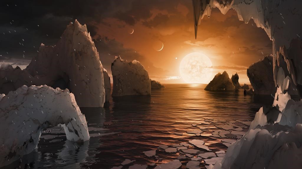 This image provided by NASA/JPL-Caltech shows an artist's conception of what the surface of the exoplanet TRAPPIST-1f may look like, based on available data about its diameter, mass and distances from the host star. The Webb Space Telescope has found no evidence of an atmosphere at one of the seven rocky, Earth-size worlds orbiting a nearby star. Scientists say that doesn't bode well for the rest of the planets in this solar system, some of which are in the sweet spot for harboring water and, therefore, life. In a study published Monday, March 27, 2023 a NASA-led team reported little if no atmosphere exists at the innermost planet in the Trappist system, 40 light-years away. (NASA/JPL-Caltech via AP)