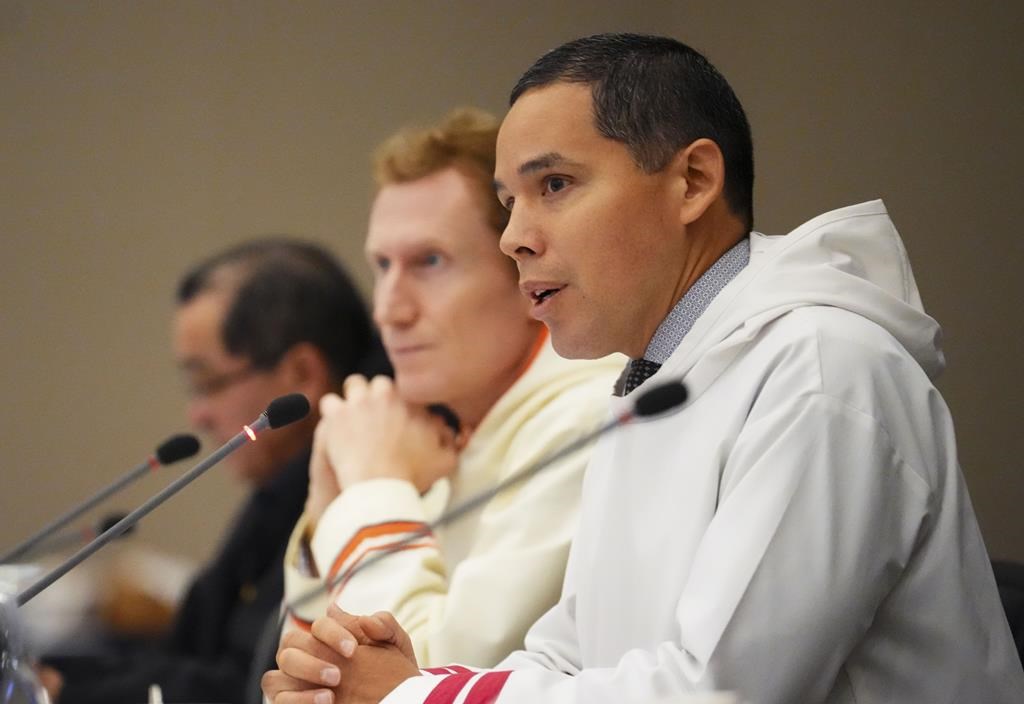 Natan Obed, President of Inuit Tapiriit Kanatami, speaks as Marc Miller, Minister of Crown- Indigenous Relationsm looks on during a meeting of the Inuit-Crown Partnership Committee in Ottawa, Thursday, Dec. 1, 2022. Obed says that despite the government's talk of fiscal restraint, it will still be spending billions — and he hopes that includes a 35-year, $75-billion commitment for infrastructure in Inuit communities. THE CANADIAN PRESS/Sean Kilpatrick