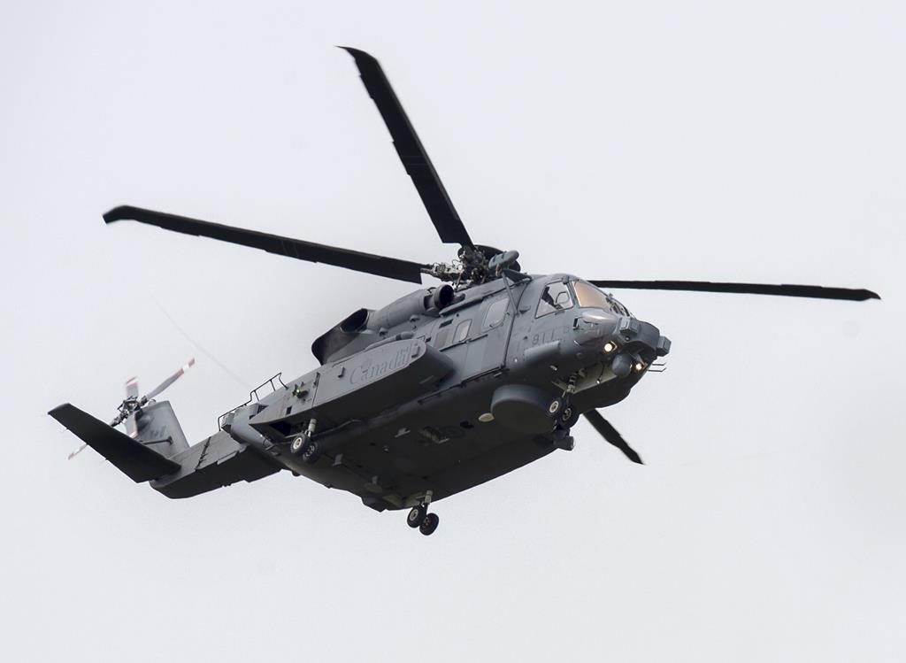 A software problem that caused a Canadian military helicopter to crash off the coast of Greece in 2020 will be fixed on the federal government's dime. A CH-148 Cyclone helicopter, flies near the base in Eastern Passage, N.S. on Tuesday, June 23, 2020. THE CANADIAN PRESS/Andrew Vaughan