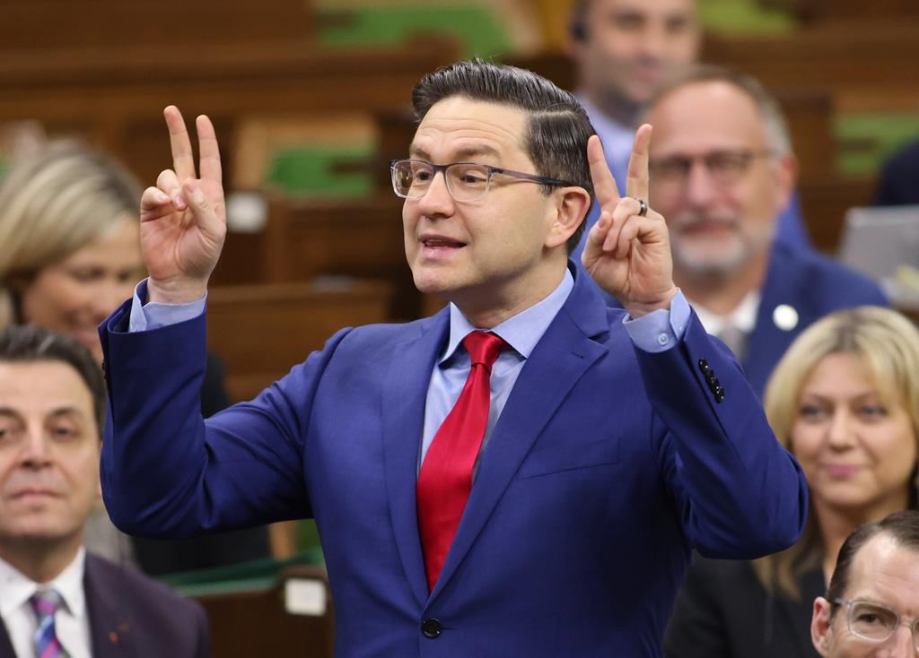 Conservative Leader Pierre Poilievre rises during Question Period in the House of Commons on Parliament Hill in Ottawa on Friday, March 31, 2023. If Poilievre wants to "defund the CBC" while maintaining its French-language services, he'll have to overhaul the country's broadcasting law in order to do it. THE CANADIAN PRESS/ Patrick Doyle