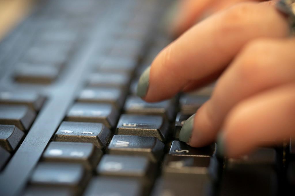 A woman types on a keyboard in New York,&nbsp;Oct. 8, 2019. The European Union’s head of combatting foreign interference in communications says Canadians can use explosive allegations about Beijing’s meddling in elections as an opportunity to improve the public’s understanding of disinformation. THE CANADIAN PRESS/AP-Jenny Kane