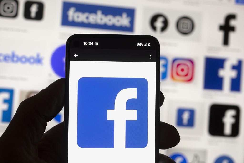 The Facebook logo is seen on a mobile phone, Oct. 14, 2022, in Boston. THE CANADIAN PRESS/AP-Michael Dwyer
