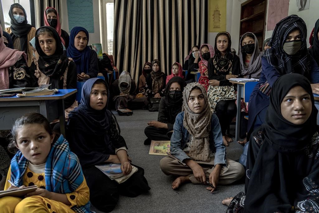 Afghan girls attend a class in an underground school, in Kabul, Afghanistan, Thursday, July 28, 2022. Ahead of the second anniversary of the Taliban takeover of Kabul, Afghan women are asking Canadians to join them in protecting gains in girls' education and resisting legitimacy for the terrorist group. THE CANADIAN PRESS/AP, Ebrahim Noroozi