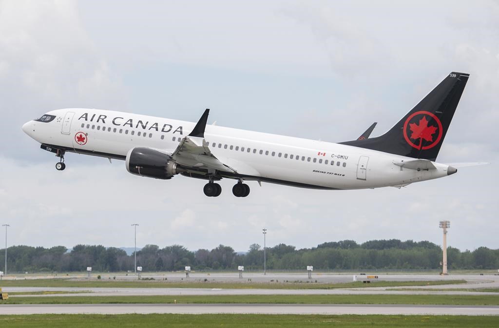 An Air Canada jet takes off from Trudeau Airport in Montreal on June 30, 2022. THE CANADIAN PRESS/Graham Hughes