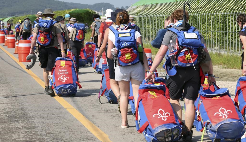 British scout members leave the World Scout Jamboree campsite in Buan, South Korea, Sunday, Aug. 6, 2023.South Korean officials they will evacuate tens of thousands of scouts, including hundreds of Canadians, from an international scouting jamboree along the country's western coast before the expected arrival of a typhoon.&nbsp;THE CANADIAN PRESS/AP-Choe Young-soo/Yonhap via AP