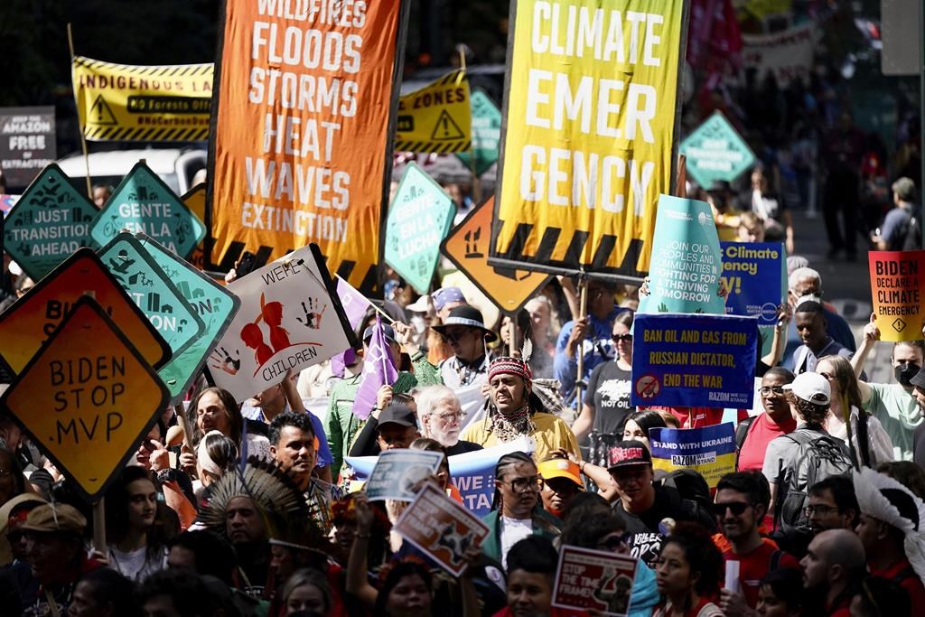 Climate activists march protesting energy policies and the use of fossil fuels, in New York, Sunday, Sept. 17, 2023. (AP Photo / Bryan Woolston)