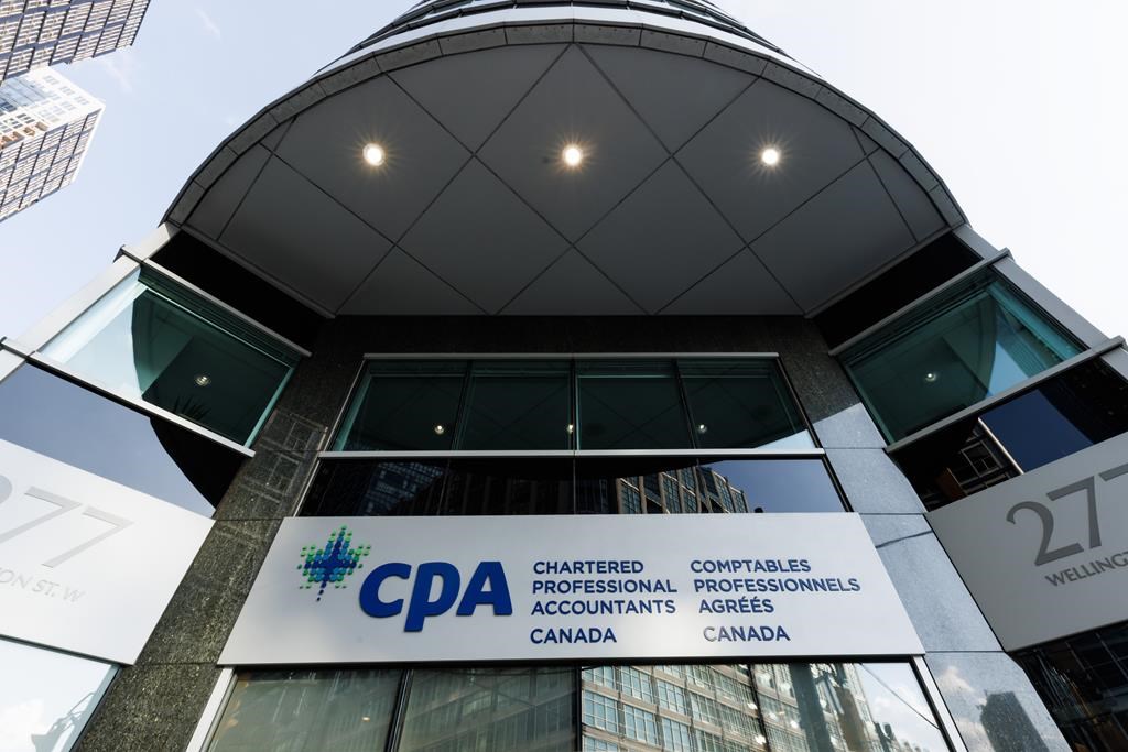 Chartered Professional Accountants of Canada is cutting 20 per cent of its workforce ahead of a move by provincial oversight bodies in Ontario and Quebec to split from the national organization. CPA Canada headquarters is seen in Toronto, Friday, Oct. 6, 2023. THE CANADIAN PRESS/Cole Burston