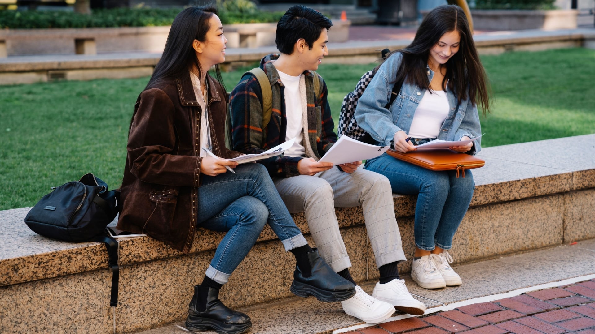 A stock photo of students at a university campus. (Pexels/George Pak)