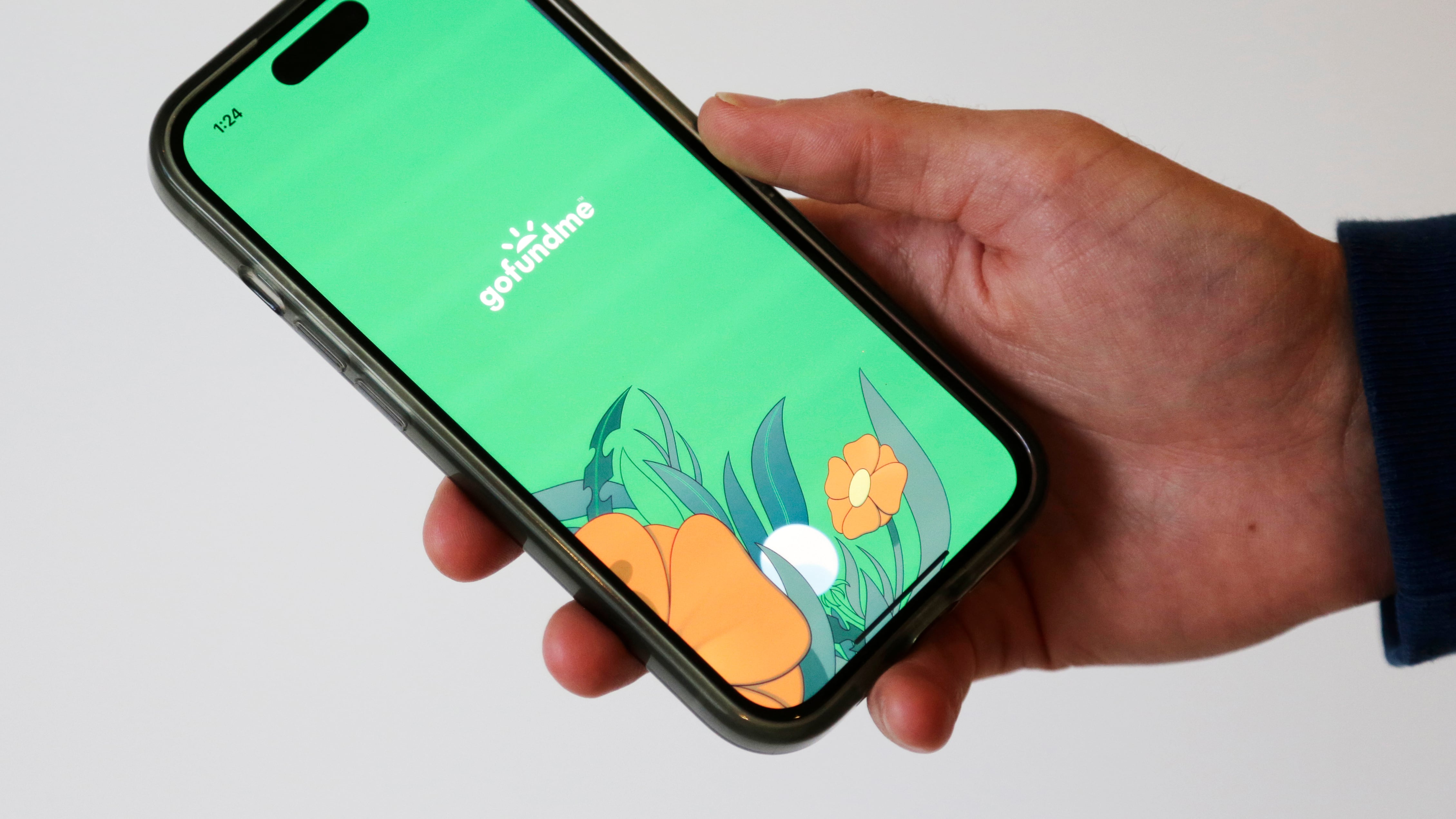 The home page for the crowdfunding platform GoFundMe is shown on a device in New York Oct. 16, 2024. (Peter Morgan / AP Photo)